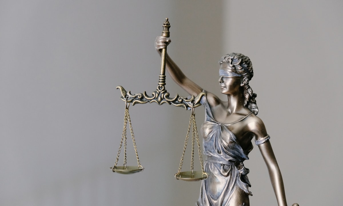 A scales-of-justice statue — representative anonymized outcomes from Lemonaid Firm's MMWA and lemon-law practice; past results do not guarantee a similar outcome